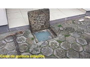 Esgotamento de caixas de gordura em condomínio na Vila Pedro Moreira